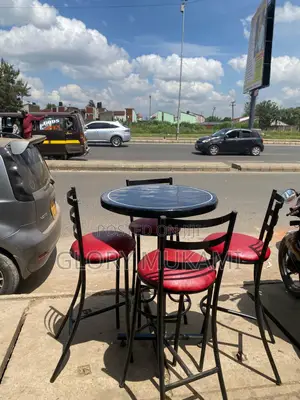 Restaurant And Bar High Chairs And Black Round Table