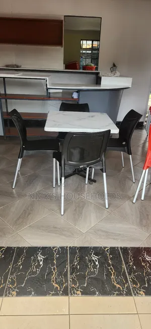 Hotel Plastic Chairs With Flowers Theme