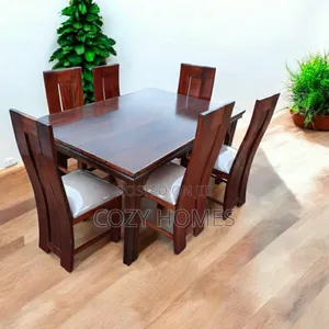 Dining Table, a Neatly Made All Wooden Dining Table
