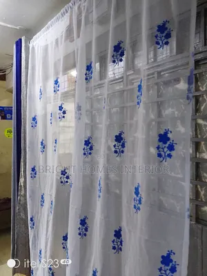 White Sheers With Royal Blue Flowers