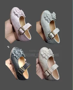 Girls Doll Shoes With a Flower Decoration