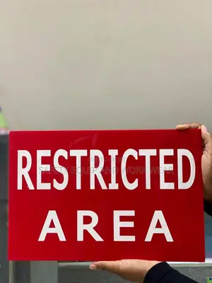 Restricted Area Sign – No Photography Allowed