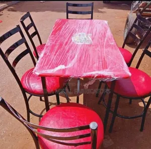 Restaurant/ Dining Set of 6 Chairs and a Table.