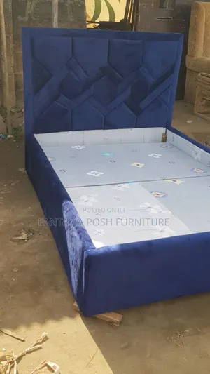 5x6 Blue Fabric Bed With Geometric Headboard Design