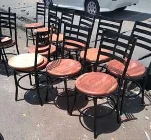 Restaurant Chairs With Mahogany Seating.