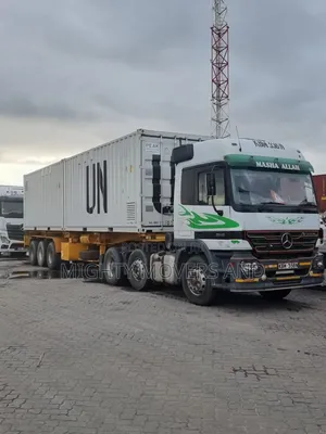 Container. Trailer at Hand for Transport.