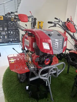Diesel Power Tiller With Attachments.