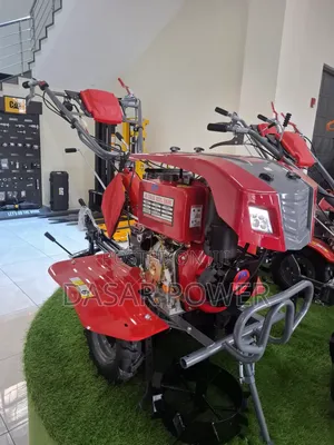 Diesel Power Tiller With Attachments.