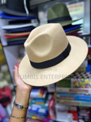 Unisex Beige Fedora Hats With a Black Band Around