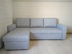 Versatile Gray Sectional L- Shaped Sofa.