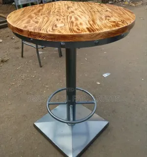 Restaurant Table With Wooden Top.