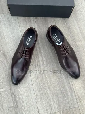 Official Leather Clarks Shoes Dark Brown in Color