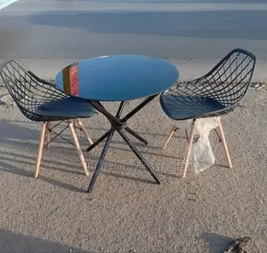 Black Table and Aemes Chairs