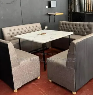 Set of Restaurant Couches With a Table