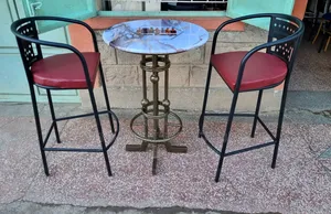 Bar-High Stools With a Unique Table.