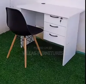 Black Eames Chair and All White Study Desk