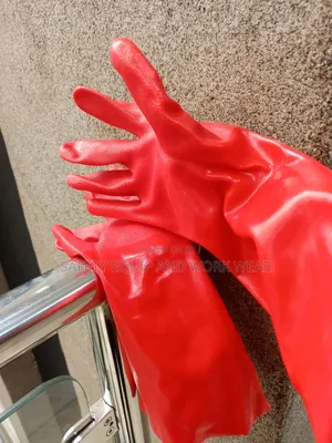 Red Pvc Gloves With Anti Slip Grip And Rugged.
