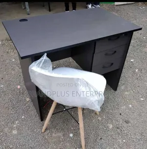 Grey Study Desk With White Eames Chairs