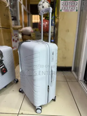 Small Light Grey Rubber Unbreakable Suitcase 56cm Height