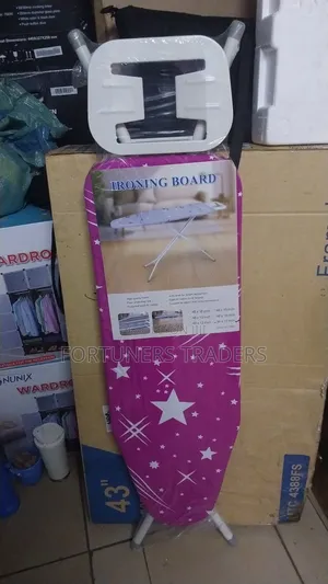 Metallic Ironing Board Within Iron Box Rest