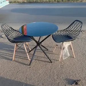 White Round Outdoor Table and Chairs