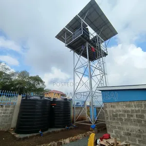 Heavy-Duty Water Towers With Solar Structures and Plumbing