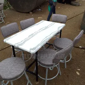 Restaurant And Bar Grey Chairs And Marble Table