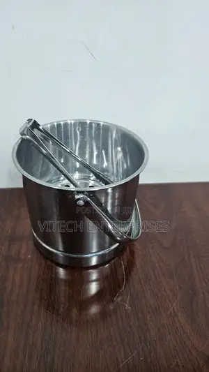 Metallic Ice Cube Bucket With a Liquid Separator Plus Tong
