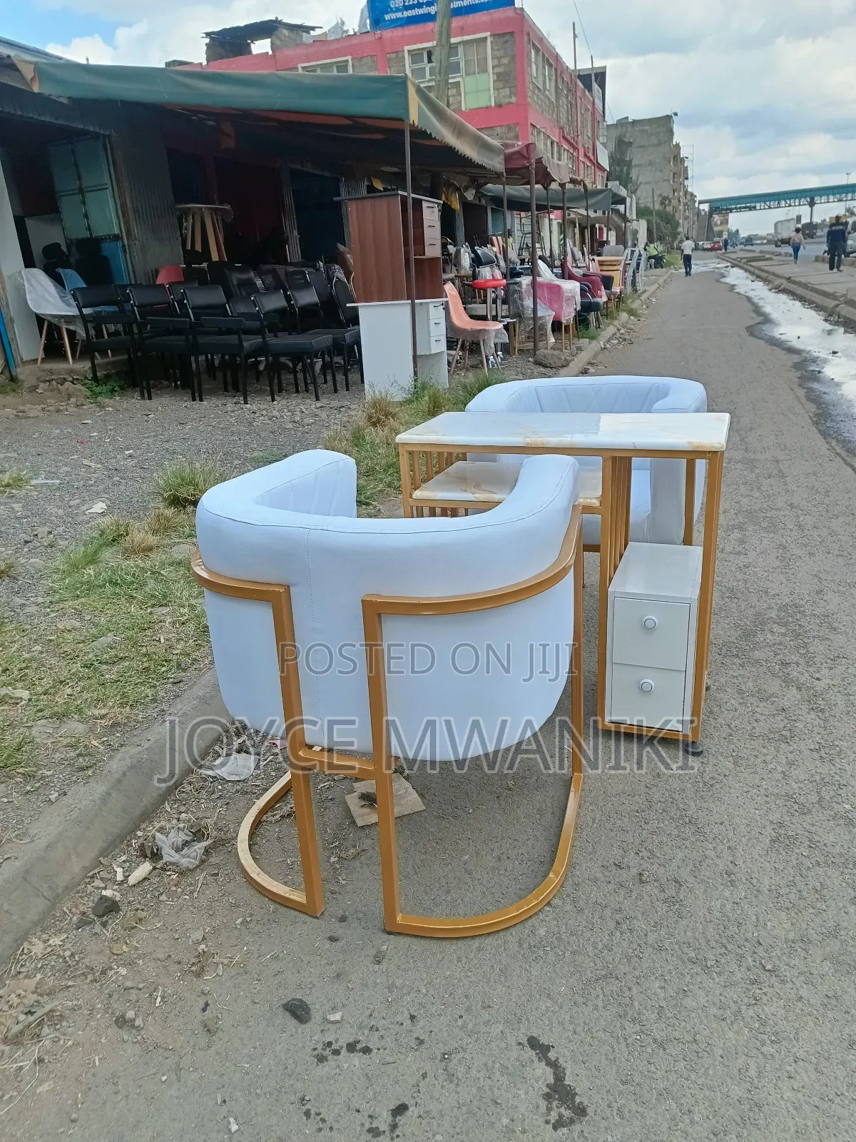Manicure Set With Marble Table and Leather Seats.