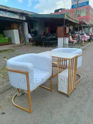 Manicure Set With Marble Table and Leather Seats.