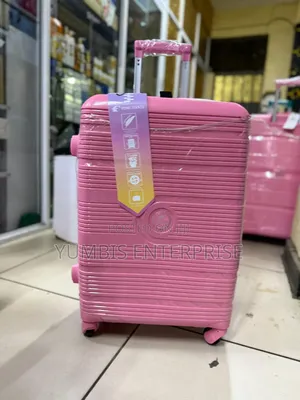 Pink Rubber Medium Suitcase 20- 22kgs at 3000