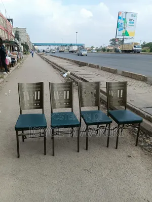 Laser Cut Restaurant Chairs Green, With Powder Coated Frame.