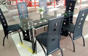 Executive 6 Sitter Glass Dinning Table With Metal Frame