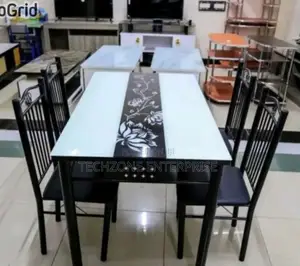 Executive 4 Sitter Dinning Table With Cushioned Seats