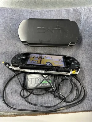 PSP/ Black PSP Chipped With 10 Plus Games