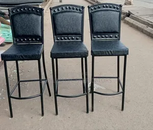 Black High Bar Stools With Studded Pattern.