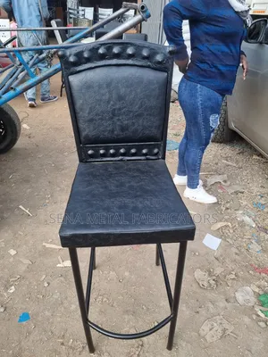 Black High Bar Stools With Studded Pattern.