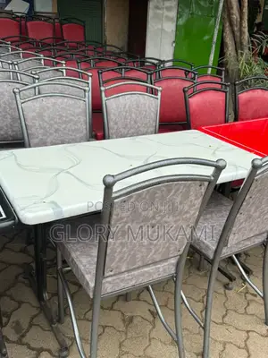 White Marble Table With Grey Chairs
