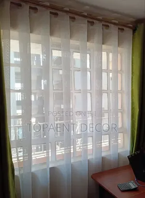 Green Eyelates Window Curtains And Plain White Sheers