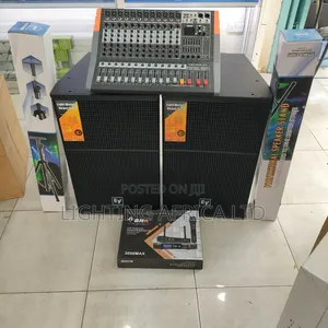 12 Channels Powered Mixer + (2) Ev 15" Mid Speakers Stand