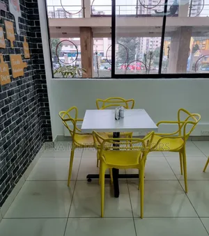 Restaurant Table With Black Powder-Coated Leg Stands