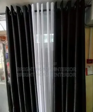 Black in Color Curtain and Plain White Sheer