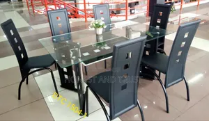 6 Sitter Glass Dining Table With Leather Seats