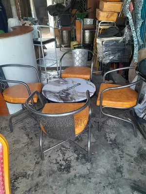 Restaurant Chairs and Round Topped Tables