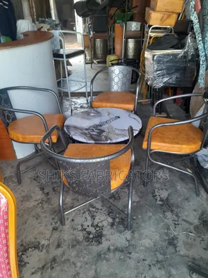 Restaurant Chairs and Round Topped Tables