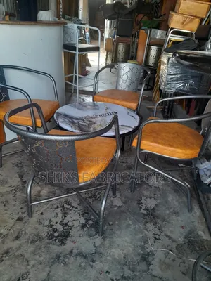 Restaurant Chairs and Round Topped Tables