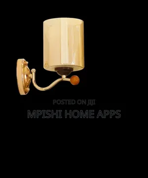 Eliante Gold Metal Wall Light