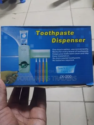 Toothpaste Dispenser With Tooth Brush Holder