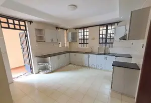 Modern Kitchen Feeting With Sink and Shelves