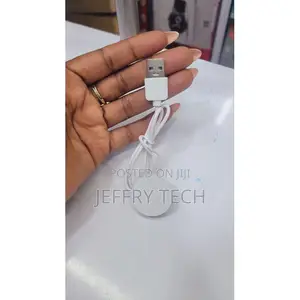 White Magnetic Smartwatch Charger – Universal Wireless Usb